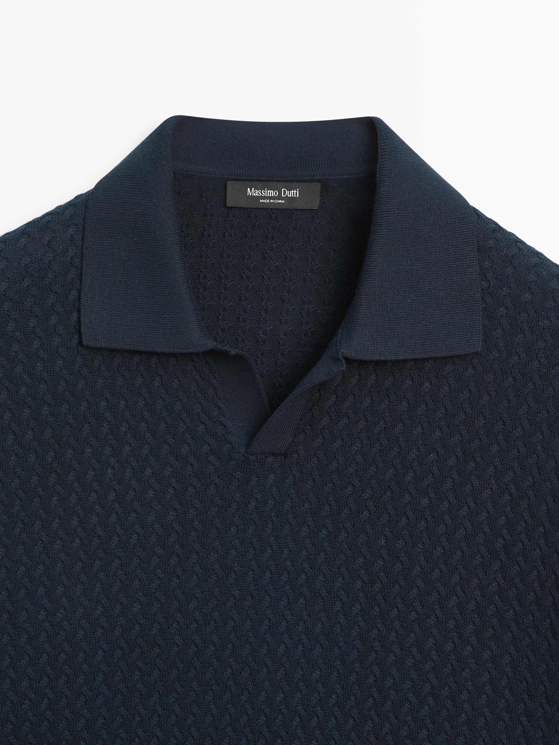 Polo en maille torsadée à col V